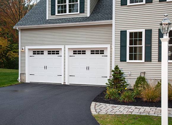 Two car garage in need of Garage Door Service in Green Bay, Appleton, Waupaca, Neenah, WI, and Surrounding Areas