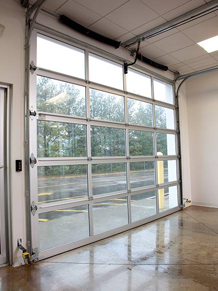 Glass garage Door installed by an overhead door companies in New London 