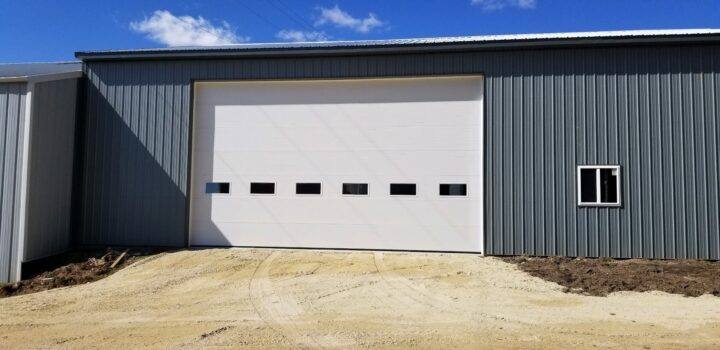 White Roll Up Garage Door After Overhead Door Repair in Green Bay, Appleton, Waupaca, New London, WI, and Nearby Cities