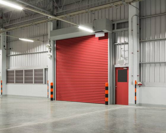 a large red garage door after a completed Overhead Door Repair in Green Bay, Appleton, New London, WI, Waupaca, Oshkosh, WI, Neenah, WI